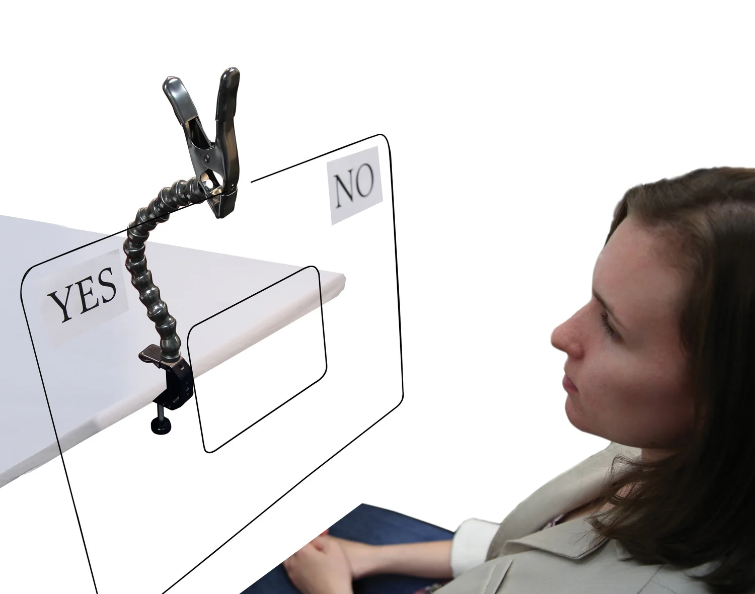 Woman using a yes-or-no eye-gaze communication board