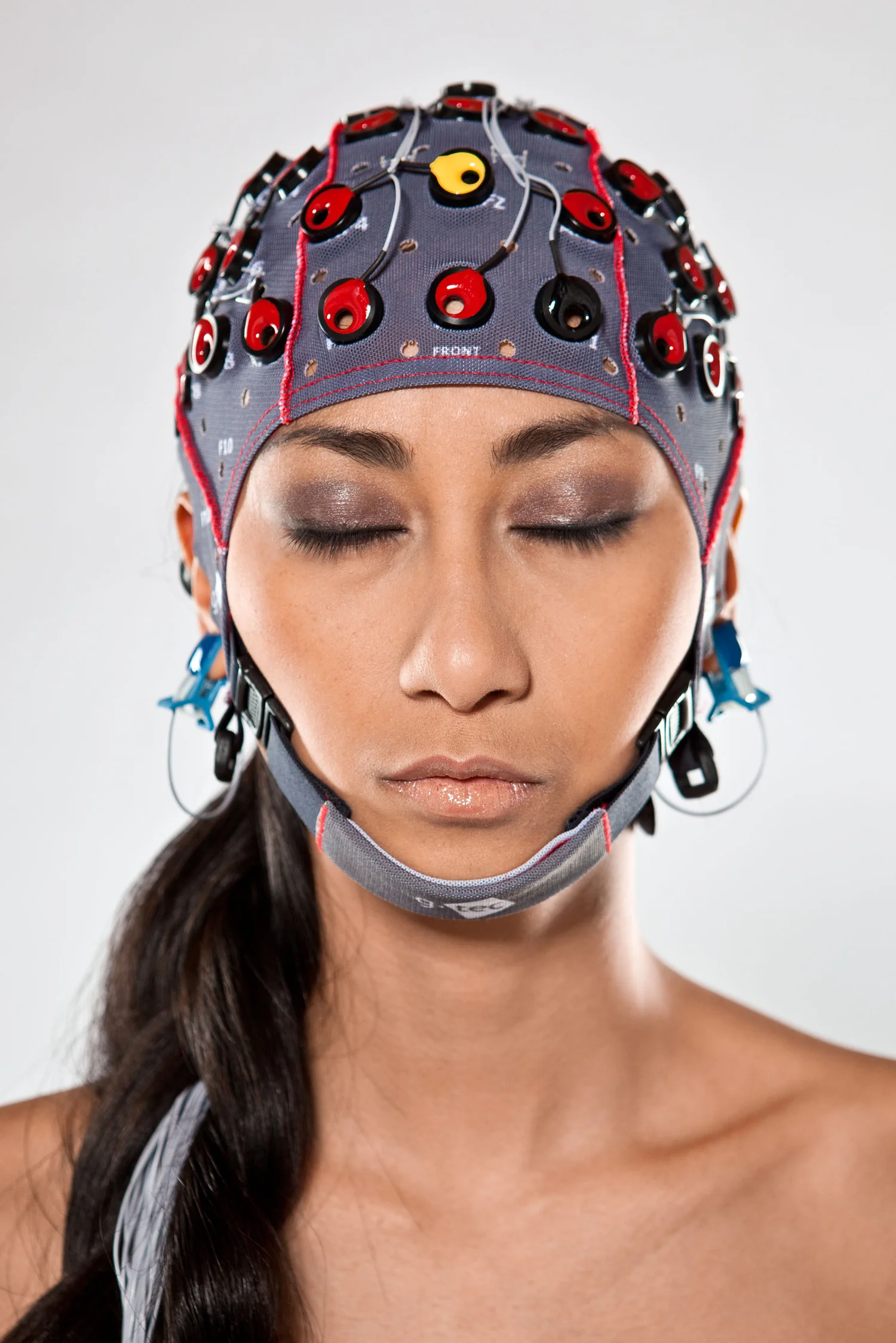 Woman wearing an electroencephalography cap