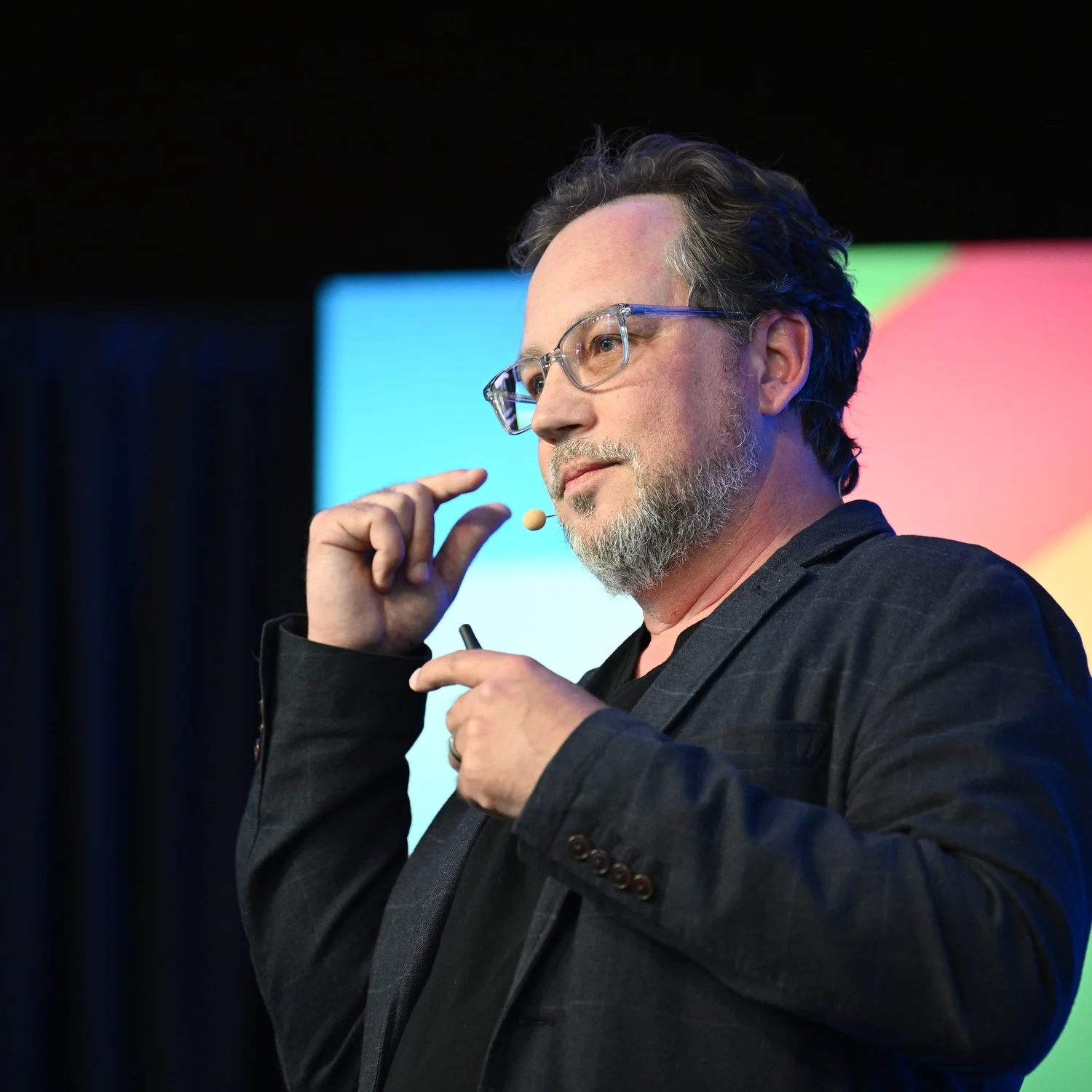 Andreas Forsland speaking onstage at the Aspen Ideas Festival
